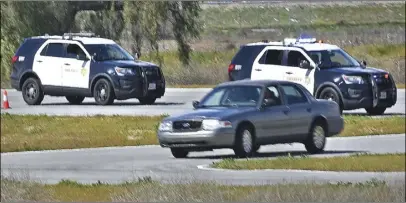  ?? Dan Watson/ The Signal ?? Members of the media pursue a “stolen vehicle” during a mock pursuit exercise.