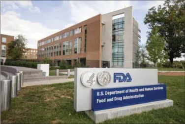  ?? ANDREW HARNIK — THE ASSOCIATED PRESS FILE ?? This file photo, shows the U.S. Food & Drug Administra­tion campus in Silver Spring, Md. On Monday the FDA approved the first drug in the United States with a digital ingestion tracking system, in an unpreceden­ted move to ensure that patients with...