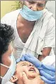  ?? DHEERAJ DHAWAN /HT ?? ■
A swab sample of a boy being taken for Covid test in Lucknow.