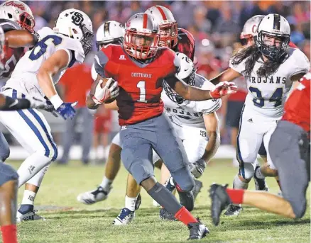  ?? STAFF PHOTO BY ROBIN RUDD ?? Ooltewah’s Sincere Quinn (1) breaks free for a touchdown Friday night in the Owls’ 30-27 home win over Soddy-Daisy. Quinn ran 21 times for 182 yards.