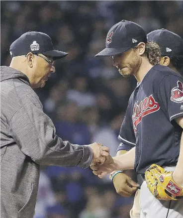  ?? JAMIE SQUIRE / GETTY IMAGES ?? Cleveland manager Terry Francona. left, is earning kudos for the way he’s been using the players at his disposal in the World Series. See nationalpo­st.com for Game 5 results.