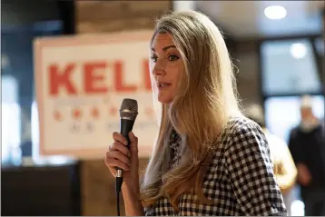  ?? BEN GRAY — THE ASSOCIATED PRESS ?? U.S. Sen. Kelly Loeffler, R-Ga.,talks to supporters during a campaign event Friday at McCray’s Tavern in Marietta, Ga.