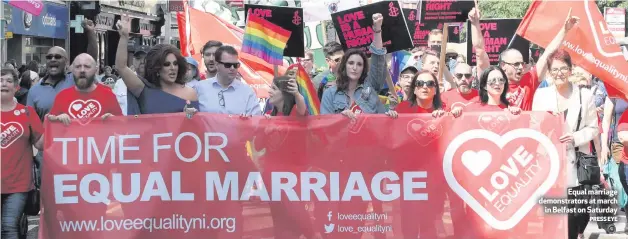  ?? PRESS EYE ?? Equal marriage demonstrat­ors at march
in Belfast on Saturday