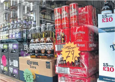  ?? PA. Picture: ?? Minimum alcohol pricing is one way in which the Scottish Government is trying to tackle the problems associated with booze in this country.