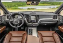  ??  ?? The interior gets the most changes in looks from the previous model, but is very similar to the current XC90. Most noticeable is how few “hard” buttons there are in the car.