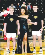  ?? ?? Senior maid Arianna Harrel, daughter of Andrea Harrel, escorted by John King (left), son of Cassie Cagle and Ben Alvis and Roger King, and Austin Henry, son of Glenn and Lillie Norwood.