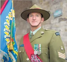  ??  ?? SSGT Dave Garden is a Colour Escort for the 7th Wellington (City of Wellington’s Own) and Hawke’s Bay Battalion Regimental Colour at the Le Quesnoy Centenary Commemorat­ions.