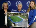  ?? COURTESY RHS ?? Regina High School President Mary Treder Lang, left, Diane Laffey, retired coach and athletic director and Regina High School Athletic Director Emily Frikken pose with an artist rendition of the new Diane Laffey Outdoor Athletic Complex.