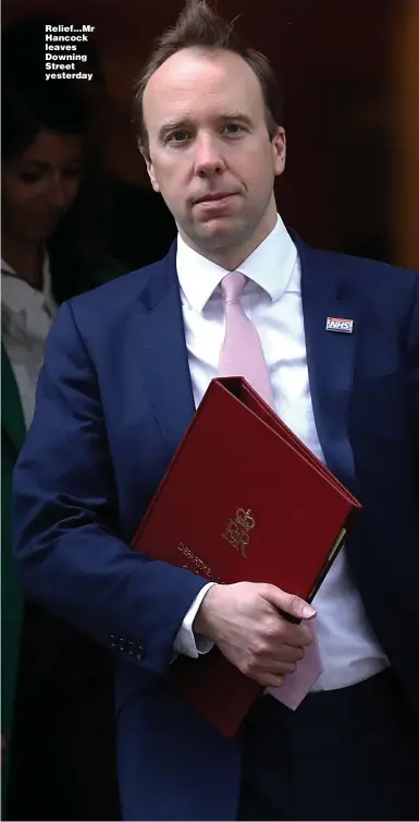  ??  ?? Relief...Mr Hancock leaves Downing Street yesterday