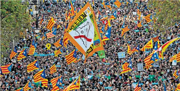  ??  ?? A pro-independen­ce demonstrat­ion in Barcelona yesterday, which was attended by around 450,000 people, called for the release of two Catalan separatist leaders accused of sedition by a Spanish judge