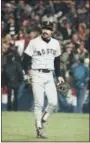  ?? THE ASSOCIATED PRESS — FILE PHOTO ?? Red Sox first baseman Bill Buckner is a picture of dejection as he leaves the field after committing an