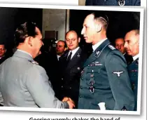  ?? ?? Goering warmly shakes the hand of Heydrich. It was Goering who authorised Heydrich to coordinate resources of the Reich for a solution of the Jewish Question throughout Europe