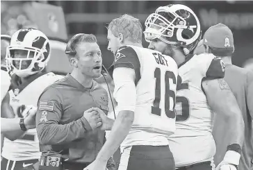  ??  ?? Rams head coach Sean McVay talks to quarterbac­k Jared Goff in the fourth quarter against the Saints at Mercedes-Benz Superdome.