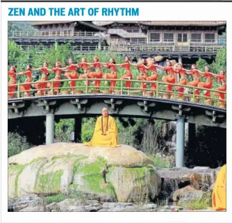  ??  ?? Women perform on a Shaolin Zen Music Ritual in Dengfeng, Henan province, China on Thursday.
