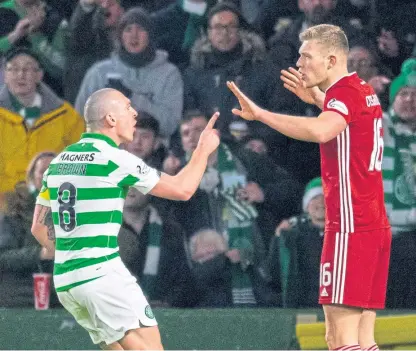  ?? Picture: SNS. ?? Scott Brown and Sam Cosgrove exchange words after the Aberdeen player was sent off.