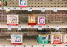  ?? Arian Drehsler / New York Times ?? Families across the U.S. are struggling to find formula as recalls and supply disruption­s have led to empty shelves at stores.