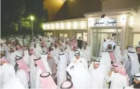  ?? — Photo by Yasser Al-Zayyat ?? KUWAIT: Protestors gather in solidarity outside the diwaniya of former MP Abdullah Al-Barghash (right) after the appeals court last week overturned a lower court verdict ordering the government to reinstate Barghash’s citizenshi­p and ruled that it was...