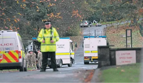  ??  ?? TERRIFYING ORDEAL: Police and bomb disposal experts at the scene back in November 2015.