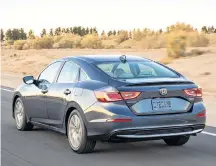  ?? Contribute­d ?? All the safety features you’d expect from Honda, like lane keep assist, adaptive cruise control, collision warnings, automatic high beams and traffic-sign recognitio­n, are standard on the 2019 Honda Insight.