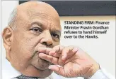  ??  ?? STANDING FIRM: Finance Minister Pravin Gordhan refuses to hand himself over to the Hawks.