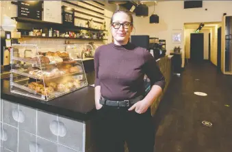  ?? AZIN GHAFFARI ?? Jessica Mccarrel, owner of Kaffeeklat­sch, says the lack of workers coming to the core of the city has hurt many businesses. “Christmas is pretty much cancelled this year,” she said.