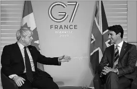  ??  ?? De Britse premier Boris Johnson en de Canadese premier Justin Trudeau tijdens de G7-top in augustus vorig jaar in Frankrijk. (Foto: HLN)