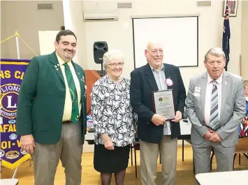  ?? ?? Trafalgar Lions Club member Graham McKenzie (second right) receives the prestigiou­s Barry Palmer Honour Award from district governor Steve Boyce, past district governor Norma Barnard and second vice district governor Kim Ainsworth.