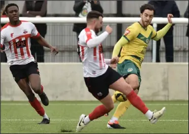  ?? Picture: Ian Scammell ?? Sheppey and Ashford do battle at Holm Park last weekend