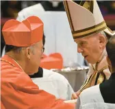  ?? ALBERTO PIZZOLI/GETTY-AFP ?? Pope Francis, right, speaks with Robert McElroy of San Diego after his elevation from bishop to cardinal during a consistory on Saturday at the Vatican.