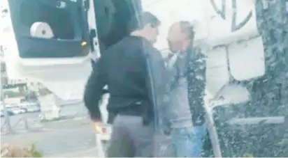  ?? (Screenshot) ?? A POLICE OFFICER attacks a Palestinia­n truck driver in east Jerusalem on Tuesday in a video that came to light yesterday.