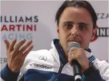  ?? MIGUEL SCHINCARIO­L AGENCE FRANCE-PRESSE ?? Le pilote de Formule 1 Felipe Massa