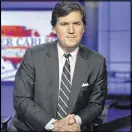  ??  ?? Tucker Carlson, host of “Tucker Carlson Tonight,” will begin airing an hour earlier to fill the time slot vacated by Bill Ot’Reilly, who lost his job