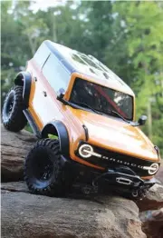  ?? ?? Armed with portal axles, switchable transmissi­on gearing and lockable front and rear diffs make driving the Bronco over obsticles a breeze.