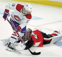  ?? FRED CHARTRAND THE CANADIAN PRESS FILE PHOTO ?? Montreal Canadiens centre Max Domi scores on Senators goaltender Craig Anderson in Ottawa on Feb. 22.