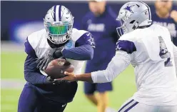  ?? LM OTERO/ASSOCIATED PRESS ?? Dallas running back Ezekiel Elliott, left, is scheduled to play in tonight’s exhibition game, then appeal his six-game suspension Tuesday in New York.