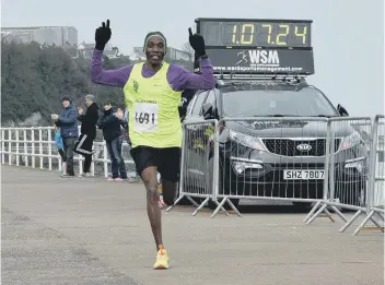  ??  ?? Gideon Kimosop wins the Larne Half-Marathon.