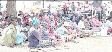  ?? ?? KaBhekinkh­osi community members waiting for their turn to get health services from nursing students of the Universiit­y of Eswatini (UNESWA).