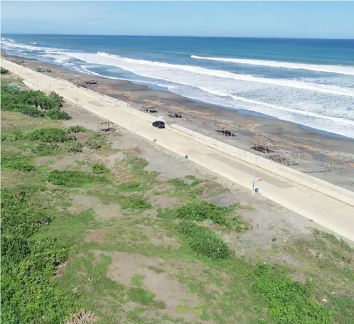  ?? PHOTOGRAPH COURTESY OF DPWH ?? Tourism booster The town of Ballestero­s in the province of Cagayan — famous for its picturesqu­e sunsets and enticing beaches — has opened a seaside boulevard under the Ballestero­s Bayview Project Phases 1 and 2.