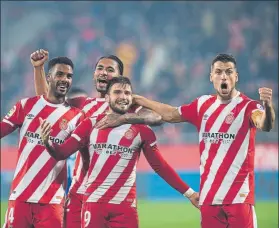  ?? FOTO: P. PUNTÍ ?? Los jugadores del Girona, celebrando un gol en un año 2018 inolvidabl­e