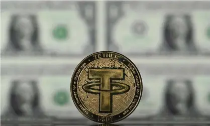  ?? Photograph: Justin Tallis/AFP/Getty Images ?? One tether token is always supposed to be traded at $1.