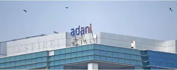  ?? — AFP photo ?? The business empire of Gautam Adani has shed tens of billions of dollars in value on the back of a report alleging accounting fraud that the Indian tycoon’s firm has strenuousl­y rejected.