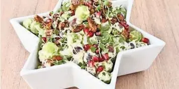  ??  ?? GRAPE salad with candied pecans.