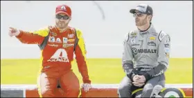  ?? Carlos Osorio The Associated Press ?? NASCAR Cup driver Dale Earnhardt Jr., left, with Jimmie Johnson at Michigan Internatio­nal Speedway in 2016, is a virtual racing fan.