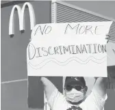  ?? FREDERICJ. BROWN/GETTY-AFP ?? A McDonald’s employee protests April 9 in Los Angeles. McDonald’s says it will start anti-harassment training worldwide in 2022.