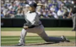  ?? THE ASSOCIATED PRESS ?? Yankees starting pitcher Masahiro Tanaka throws to a Mariners batter during the fifth inning Wednesday in Seattle.