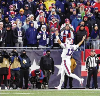  ?? WINSLOW TOWNSON/AP ?? Quarterbac­k Josh Allen is enjoying himself in Foxborough, Mass., Dec. 26 as the Bills earn their third win in the past four meetings against the Patriots, who at one point dominated the series with 15 straight wins. Buffalo also has won the past two AFC East titles and faces New England again today.