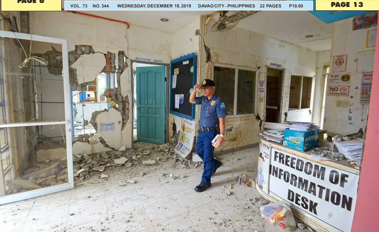  ??  ?? POLICE Lt. Nilo Emborgo, officer in charge of Hagonoy Municipal Police Station, exits from his station that was totally damaged by the Sunday earthquake. The Hagonoy police station in Davao del Sur was inaugurate­d last July 18, 2018. Five other police stations in the province were also damaged. BING GONZALES