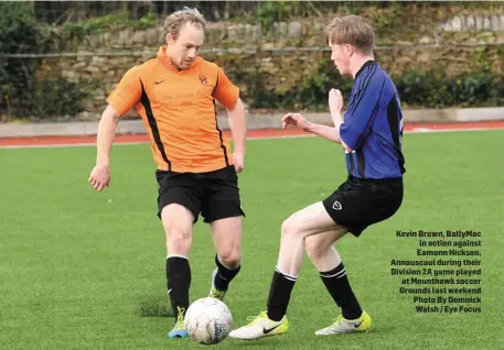  ??  ?? Kevin Brown, BallyMac in action against Eamonn Hickson, Annauscaul during their Division 2A game played at Mounthawk soccer Grounds last weekend Photo By Domnick Walsh / Eye Focus
