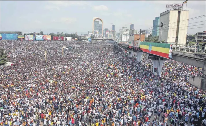  ??  ?? The real deal? Ethiopians attend a rally in support of new Prime Minister Abiy Ahmed, who has already fundamenta­lly altered the country’s political landscape. Photo: Reuters