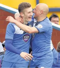  ?? www.mphotograp­hic.co.uk ?? ●●Dan Cowan, left, celebrates his goal against Dalrington with Sam Minihan